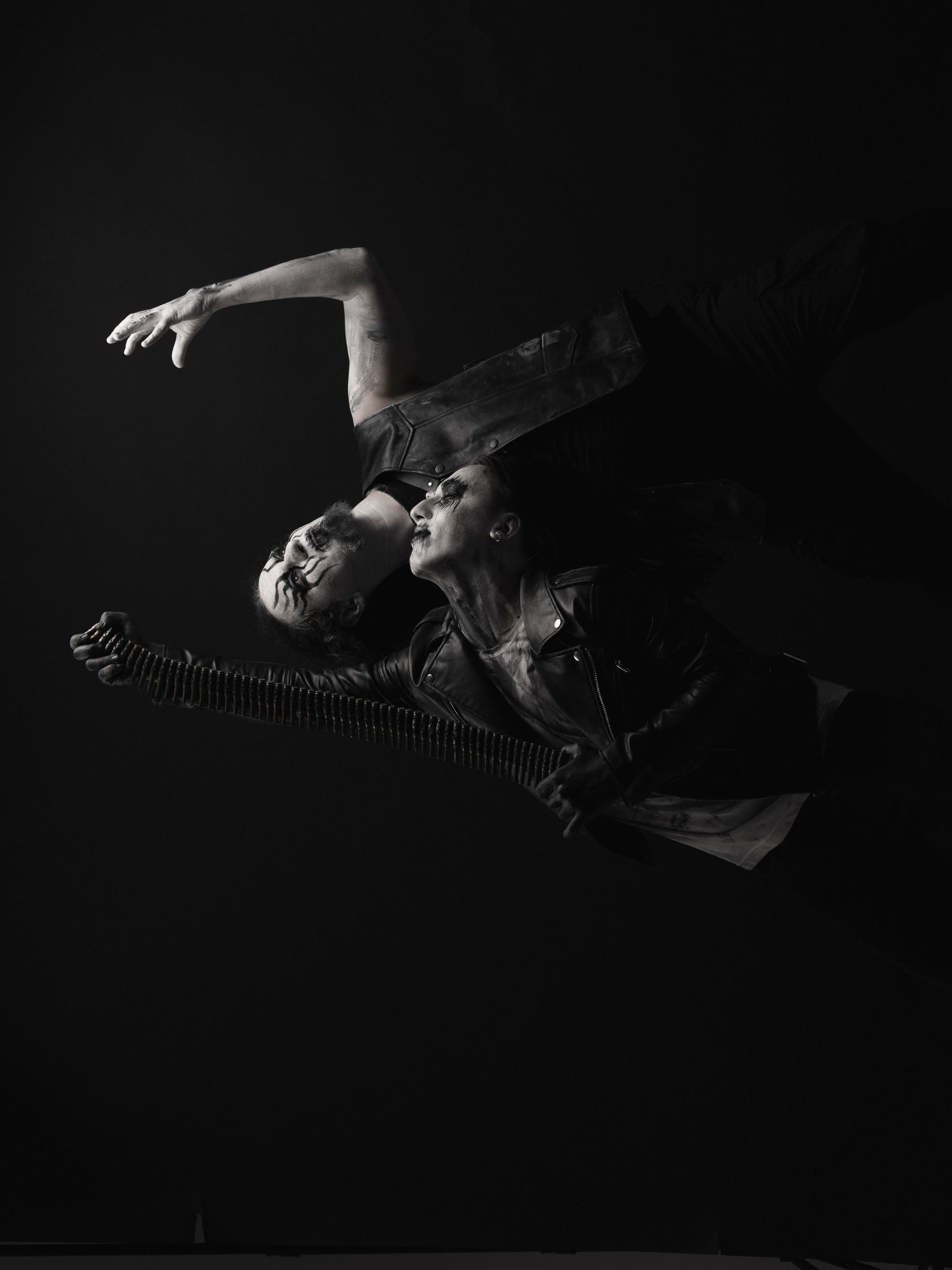 Black and white photograph of a figure in motion